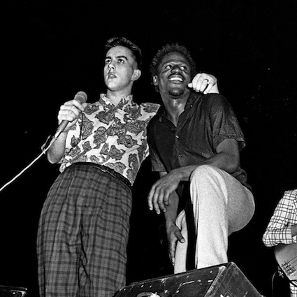 Two male members of British band The Specials, on stage at Potternewton Park in Leeds in 1981.